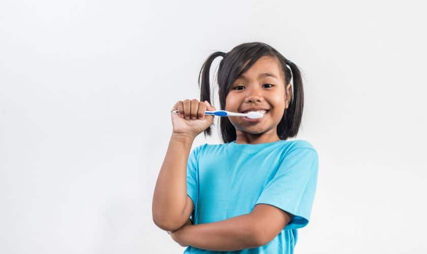 How do I choose the right toothpaste and toothbrush for my child?